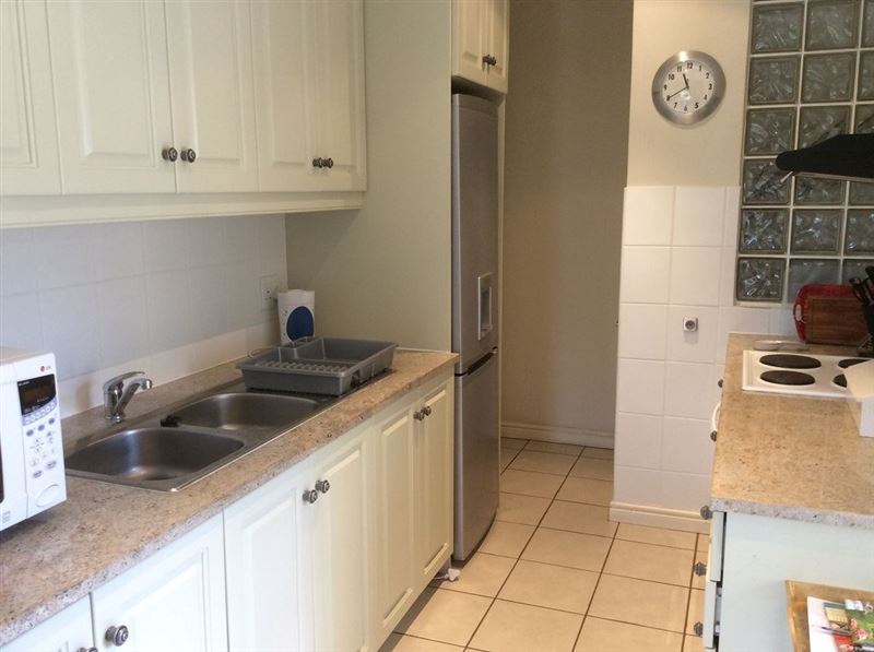Kitchen with washing machine, dishwasher etc