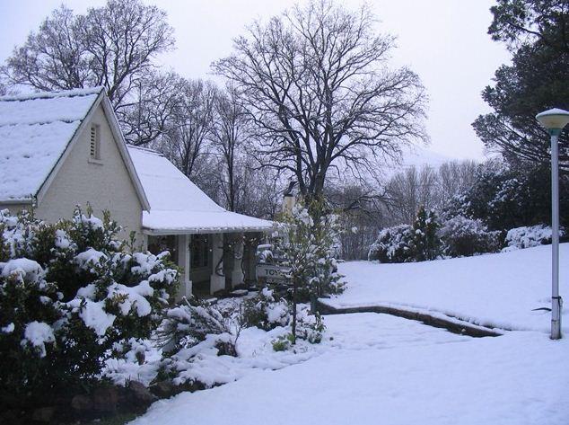 Snow-covered cottage