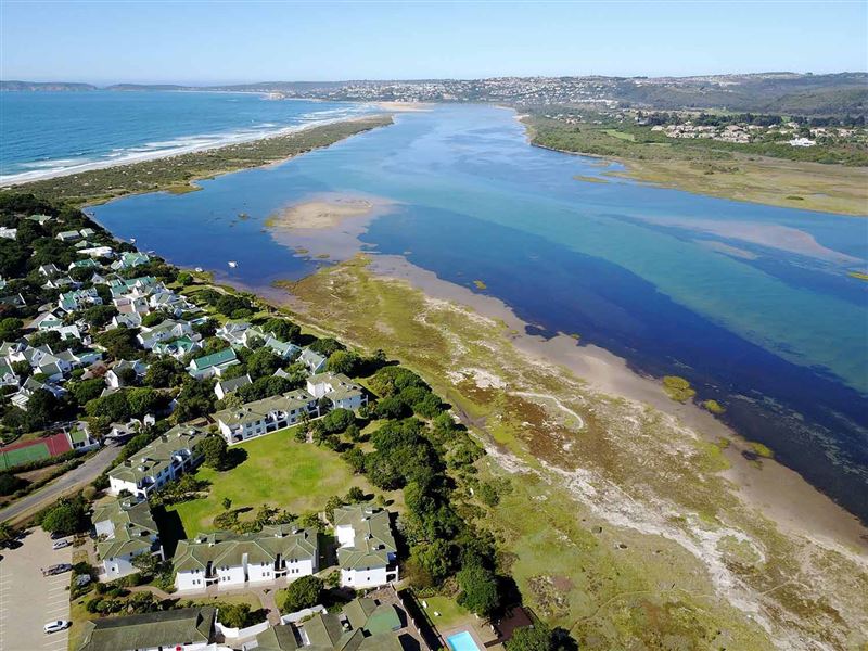 Resort from above showing proximity to river and beach