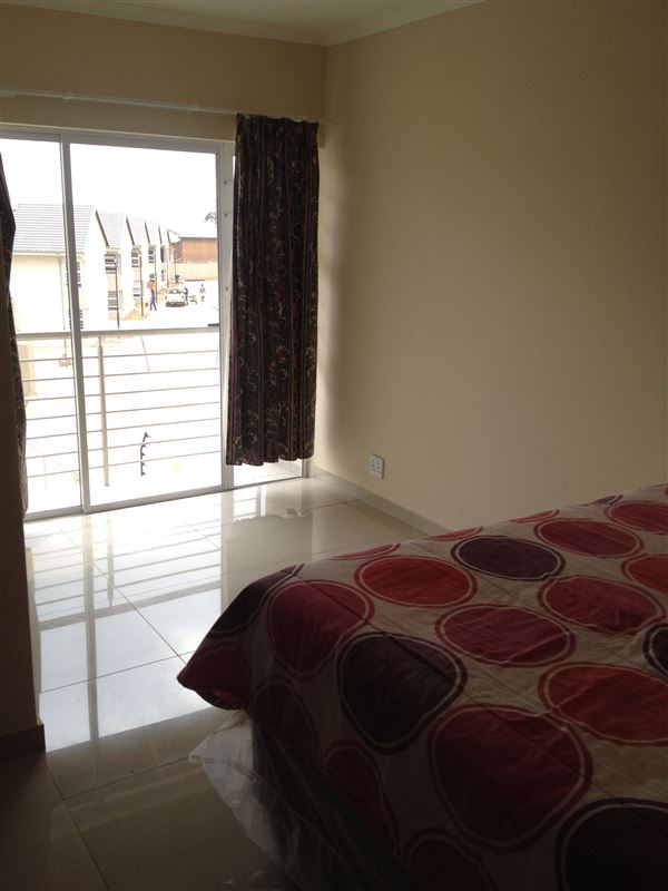 Bedroom with a balcony