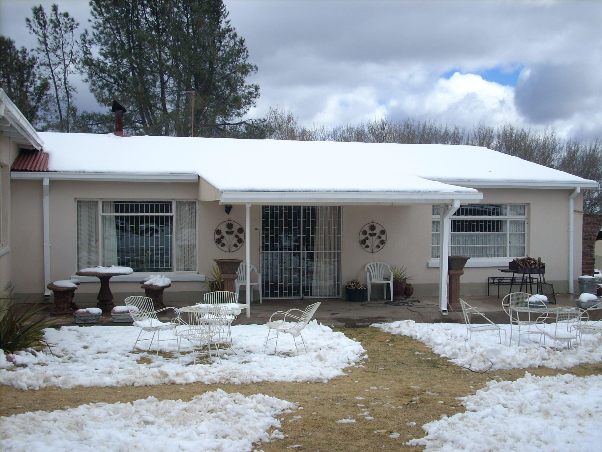 Snow-covered cottage