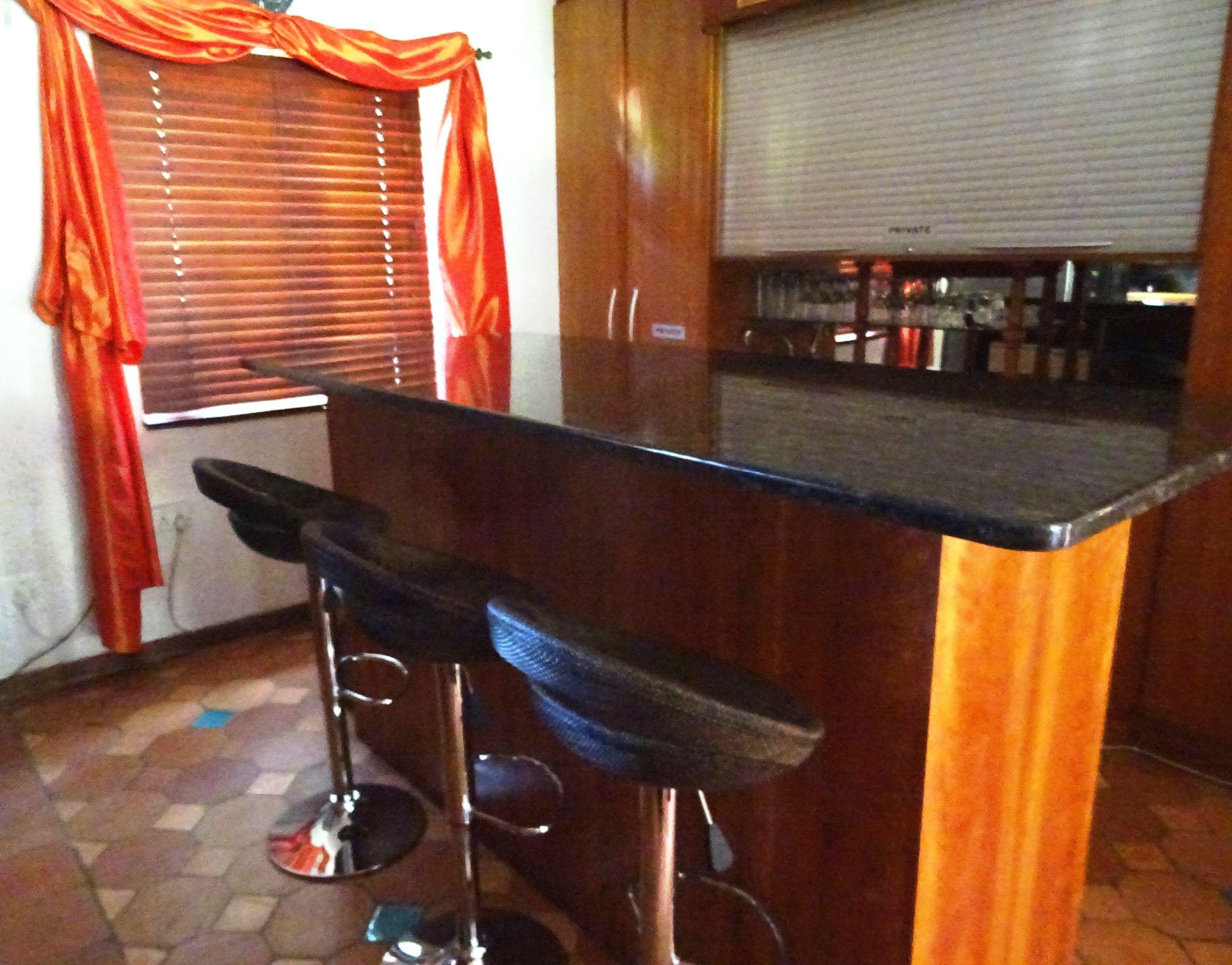 Open plan bar area with 2 bar fridges - Accommodation Hartbeespoort dam © Petro Lessing-Landman