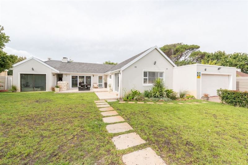 There is a functioning pool as well as a large garden with a trampoline for the kids. 