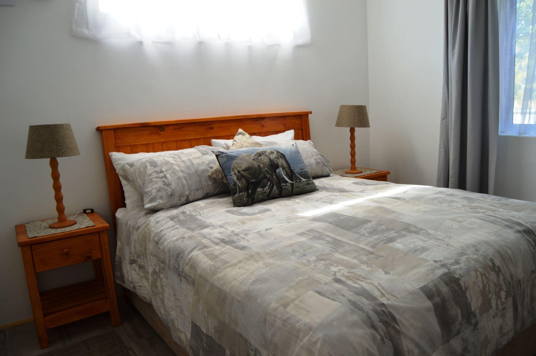 The main bedroom has a queen bed, dressing table and built-in cupboards © G Mitchell