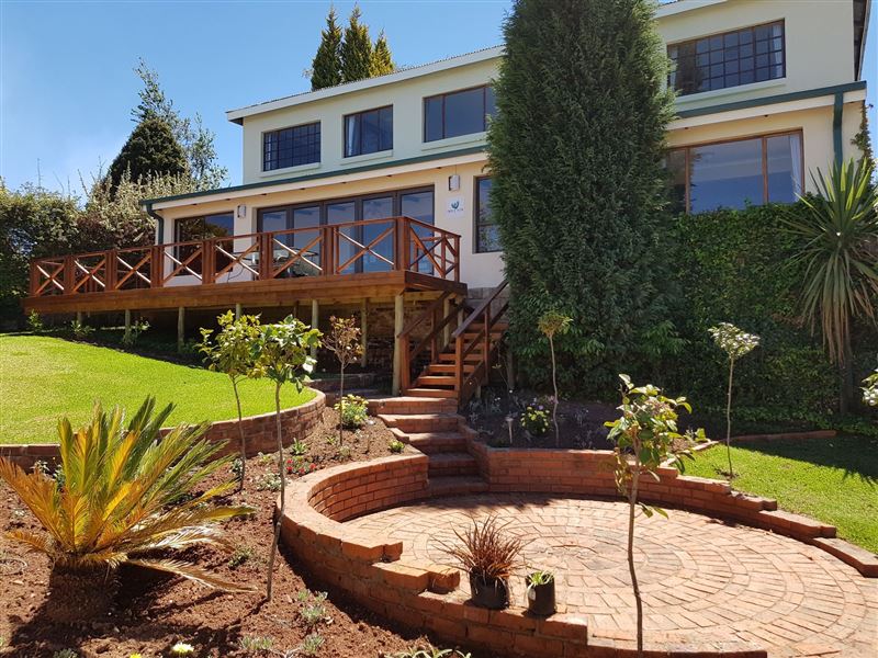 Garden and Facade © Amber Collection