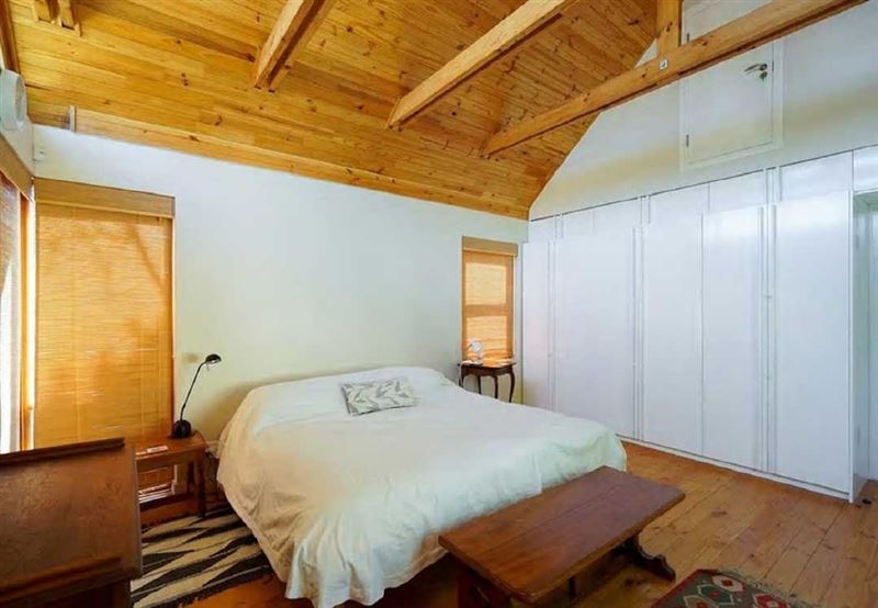 King Sized bed and built in Cupboards