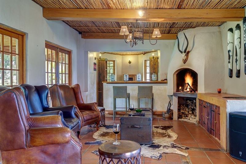 Communal Living room with inside braai and bar
