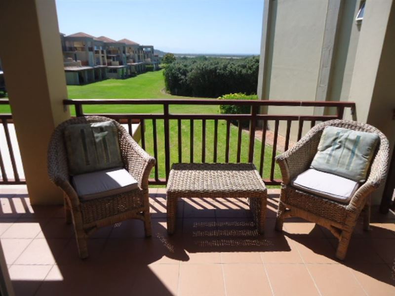Outdoor sitting area leading off main bedroom.