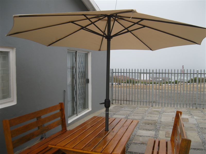 Patio and braai area with beautiful sea view