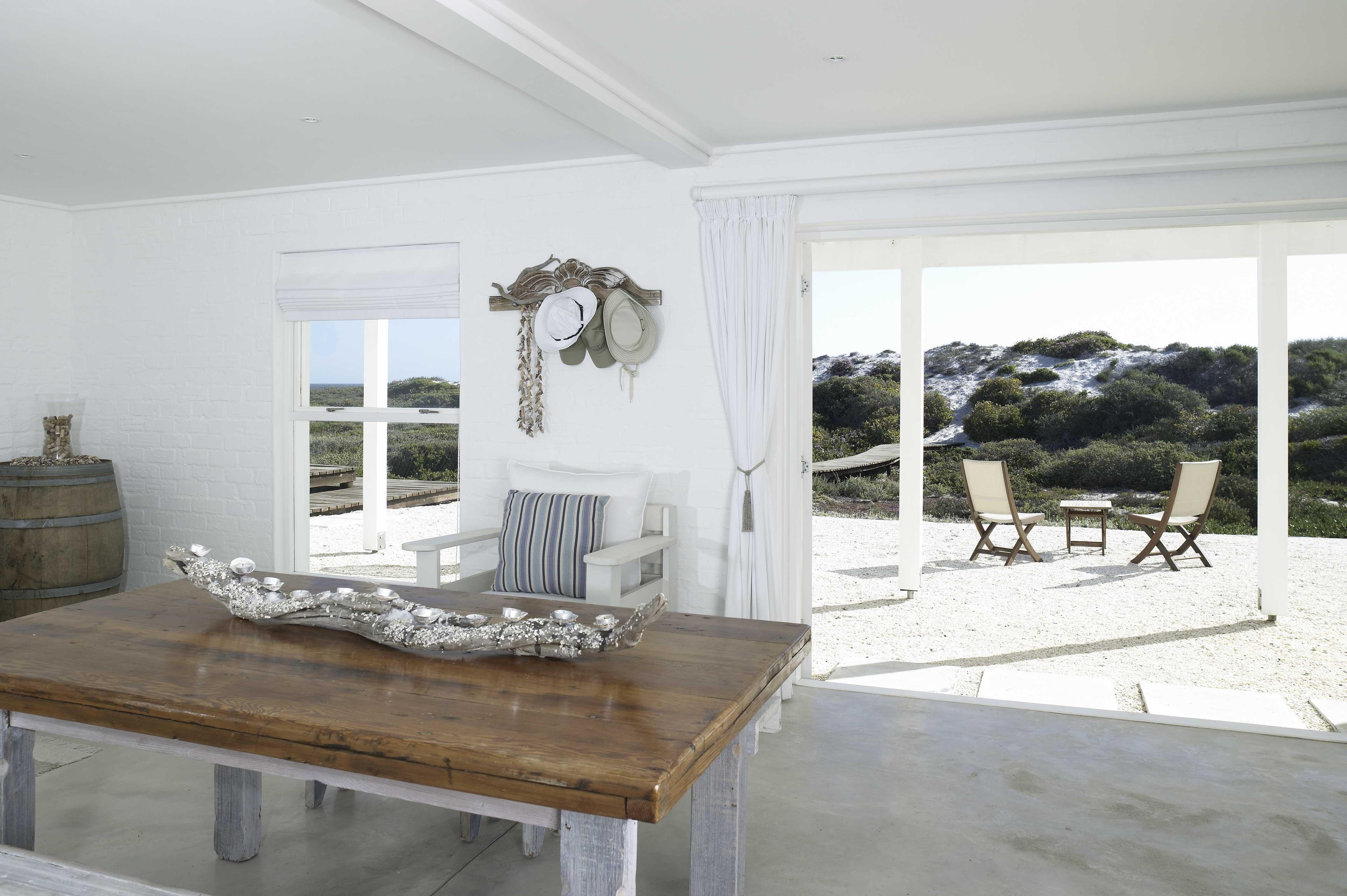 Situated on the beach and connected by a private boardwalk