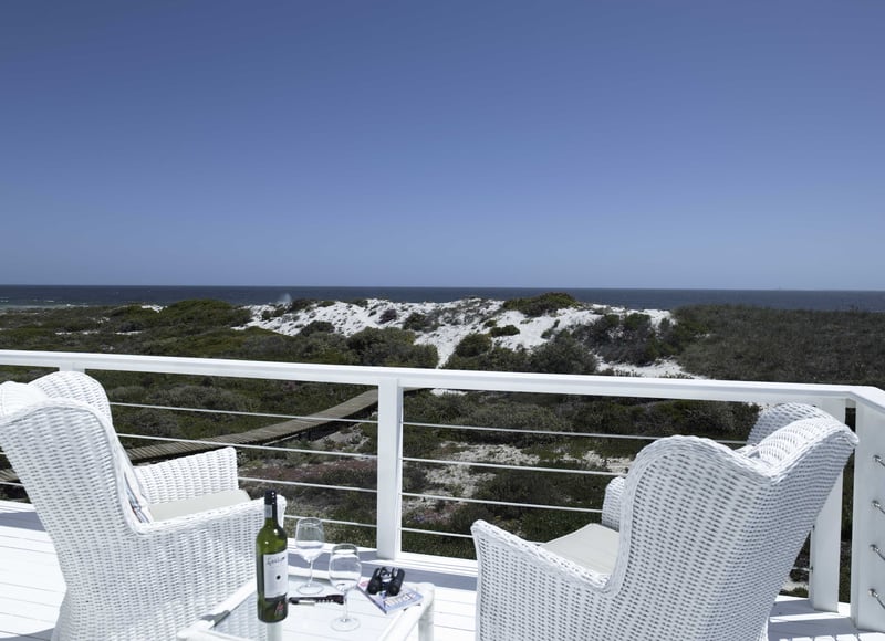 Situated on the beach and connected by a private boardwalk