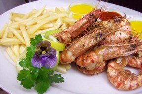 8 suculent prawns served with lemon butter, garlic butter and peri-peri sauce with your choice of chips, rice or salad