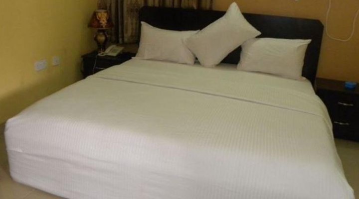 Grandy Suites Hotel