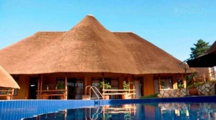 Le Petit Village Hotel