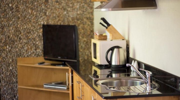 Le Petit Village Hotel