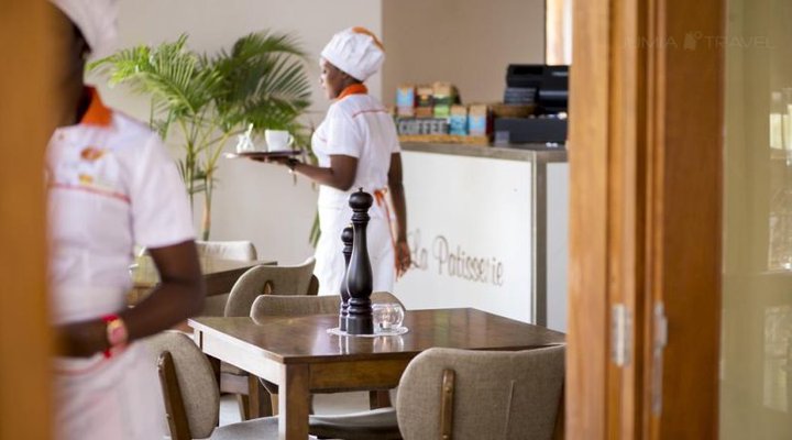 Le Petit Village Hotel