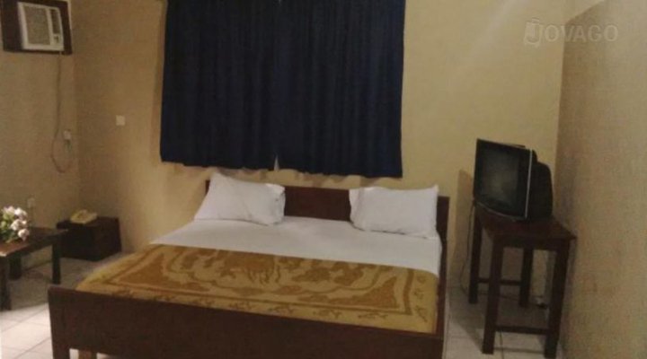 Queen's Park International Hotel