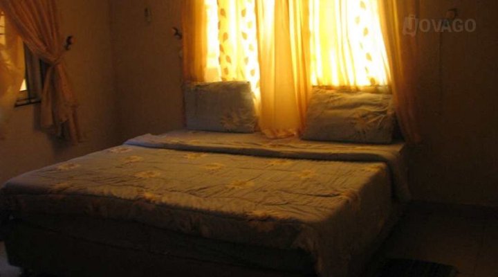 Next Level Hotel &Suites