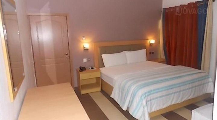 Magnum Hotel And Suites