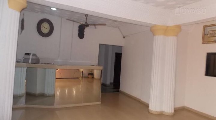 Glass House Hotel & Suites Limited