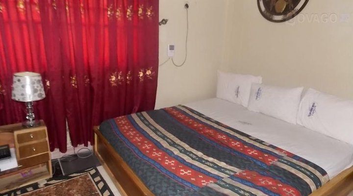 Glass House Hotel & Suites Limited