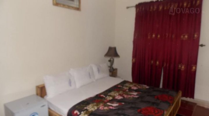 Glass House Hotel & Suites Limited