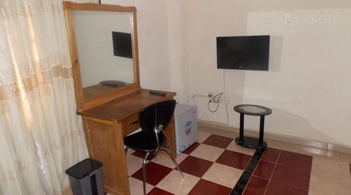 Glass House Hotel & Suites Limited