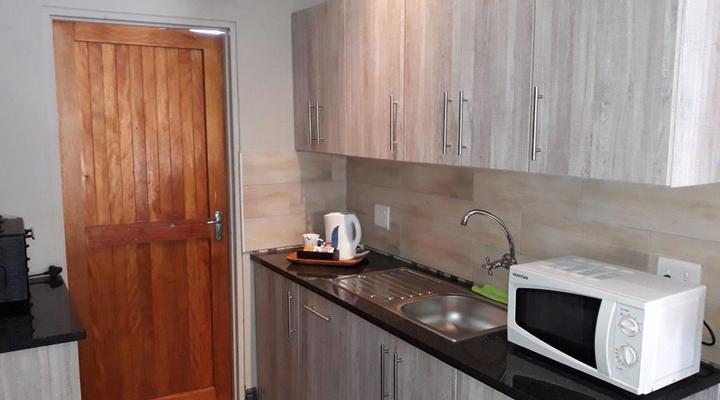 PMG Hardware T/A Wisteria Lane Guest House