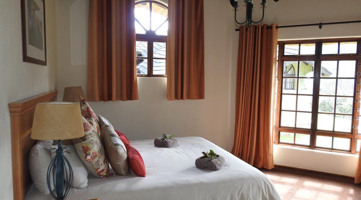 Drakensberg Gardens Fairways - Heartwood Mountain Cottage