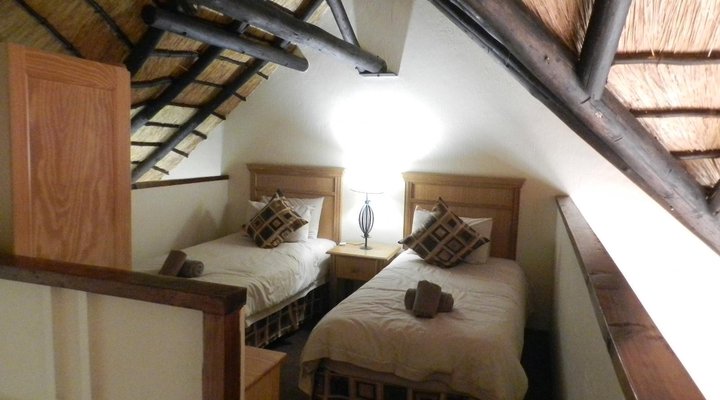 Drakensberg Gardens Fairways - Heartwood Mountain Cottage