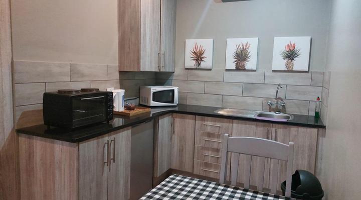 PMG Hardware T/A Wisteria Lane Guest House